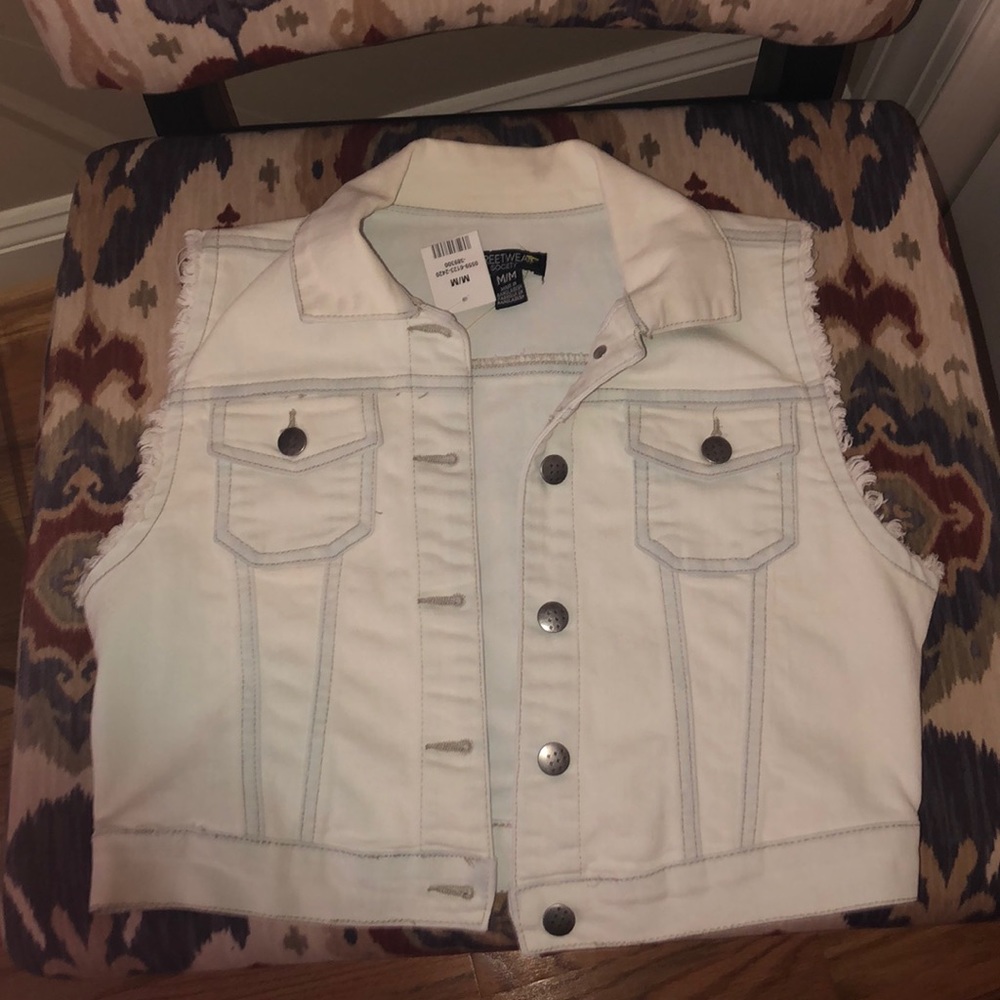 Jean jacket. Brand new. With tags